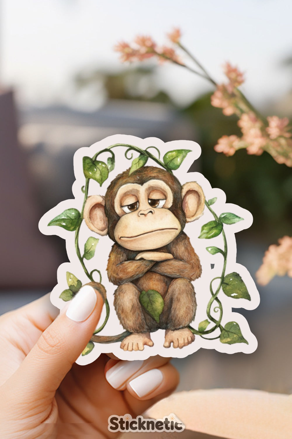 Cute Sitting Monkey Surrounded by Leaves Sticker product