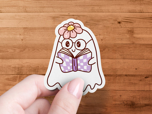 Adorable Ghost Reading a Book Cartoon Sticker product