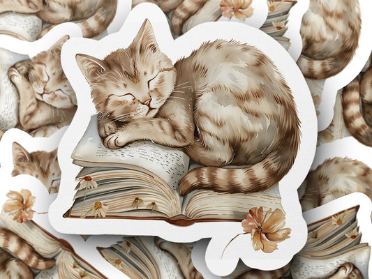Sleeping Cat on Open Book with Flowers sticker product