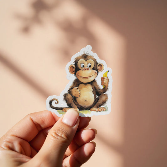 Adorable Cartoon Monkey Holding Banana Sticker product