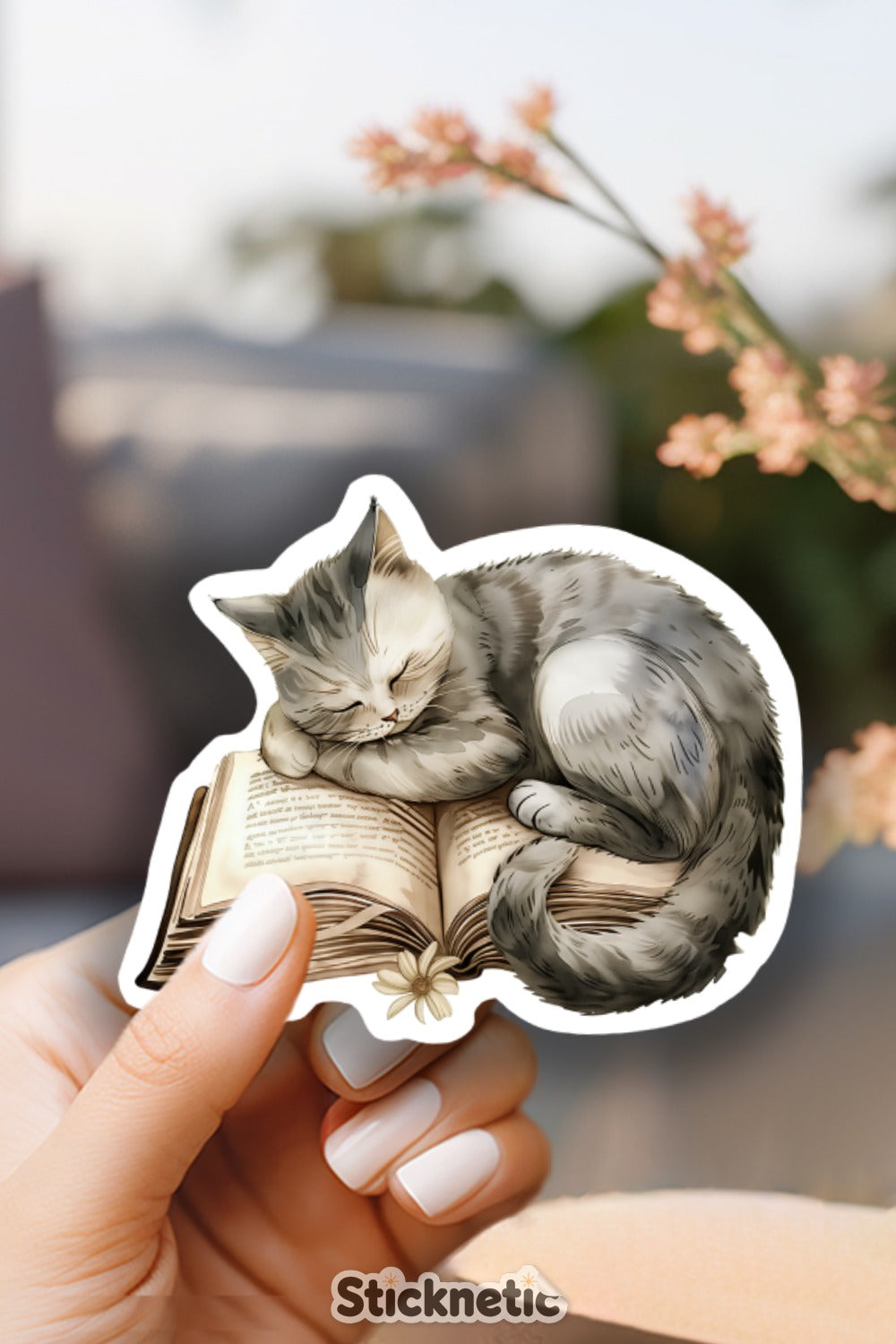 Cute Cat Sleeping on Open Book Sticker product