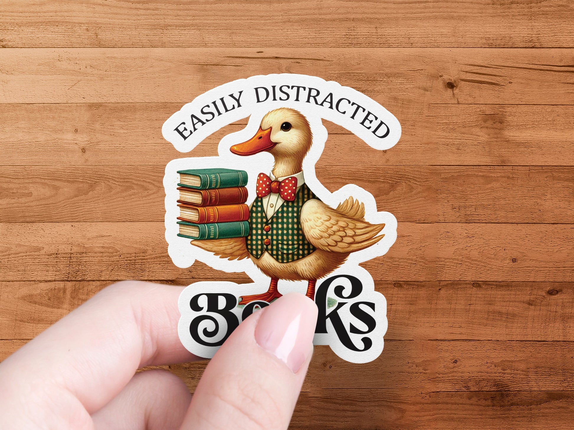 Easily Distracted Duck Holding Books Sticker product