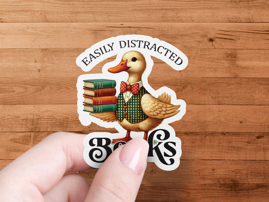 Easily Distracted Duck Holding Books Sticker product