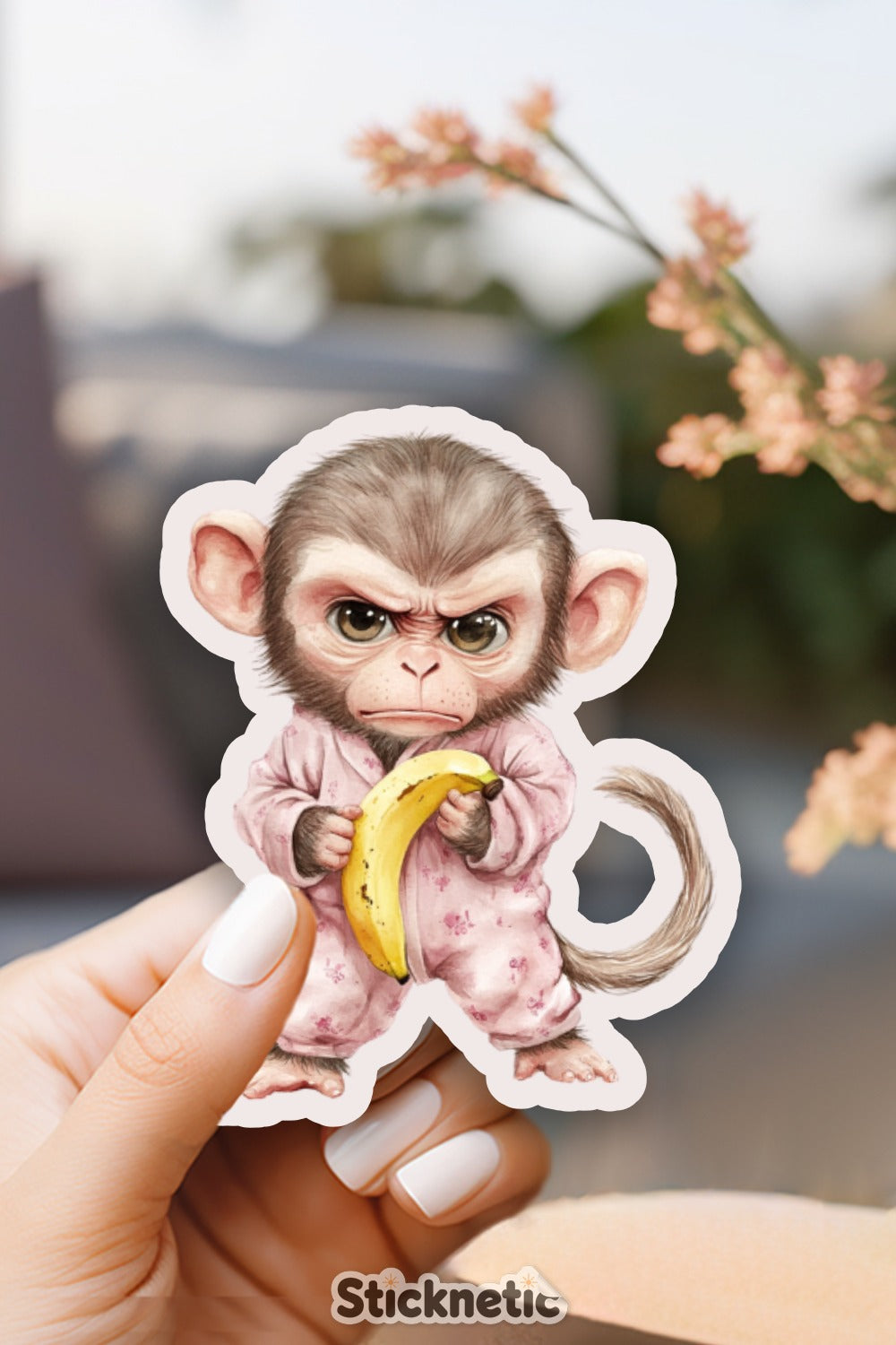Adorable Baby Monkey Holding Banana Sticker product